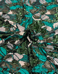 Tissu vert chasseur Giselle à paillettes florales multicolores