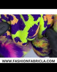 Tela de piel sintética con estampado de leopardo y arco iris de neón