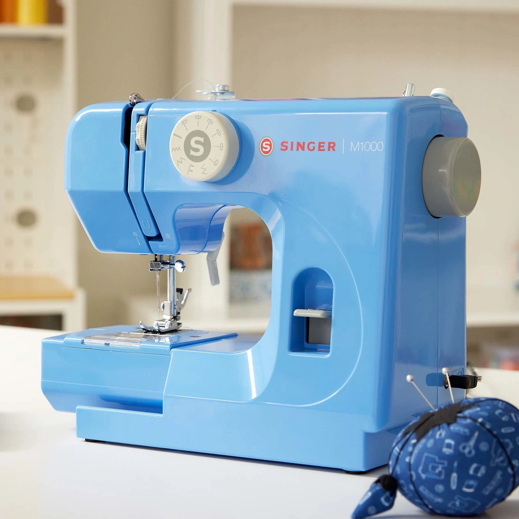 SINGER® M1000 Blue Mending Machine - Fashion Fabrics LLC