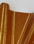 Tissu vinyle à paillettes dorées foncées