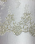 Ivory Gold Oswald Embroidered Lace Fabric - Fashion Fabrics LLC