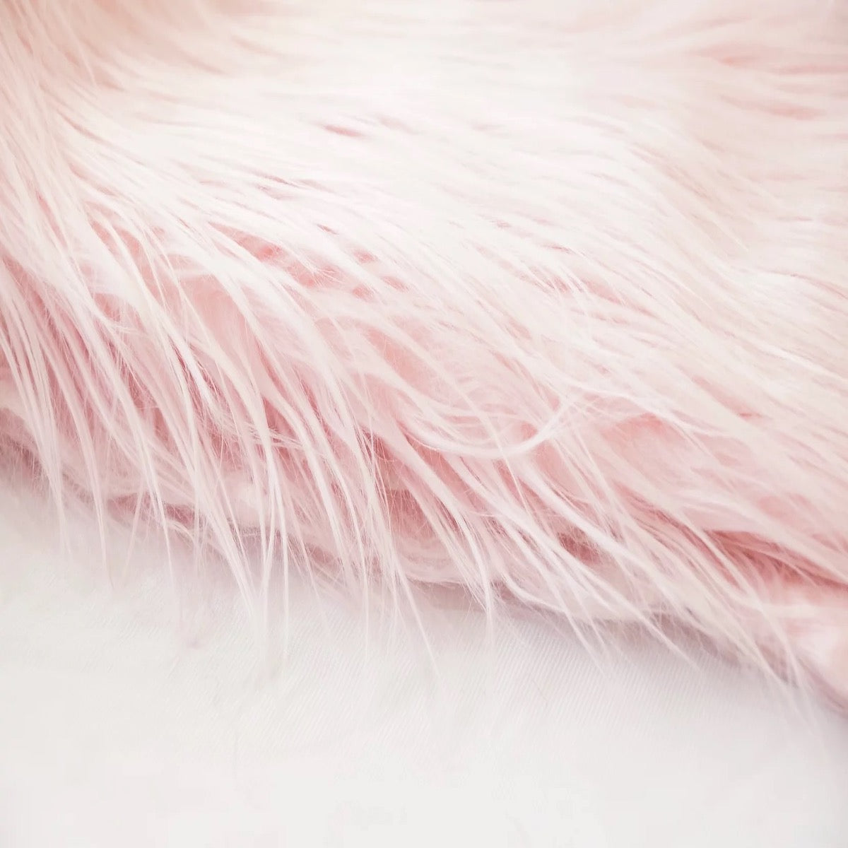 Light Pink Shaggy Long Pile Faux Fur Fabric (4&quot;) - Fashion Fabrics LLC
