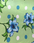 Green Lily Flowers Poly Cotton Fabric - Fashion Fabrics Los Angeles 