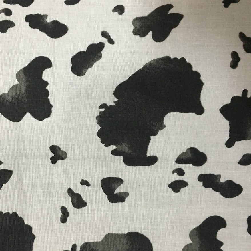 Black White Cow Print Poly Cotton Fabric - Fashion Fabrics Los Angeles 