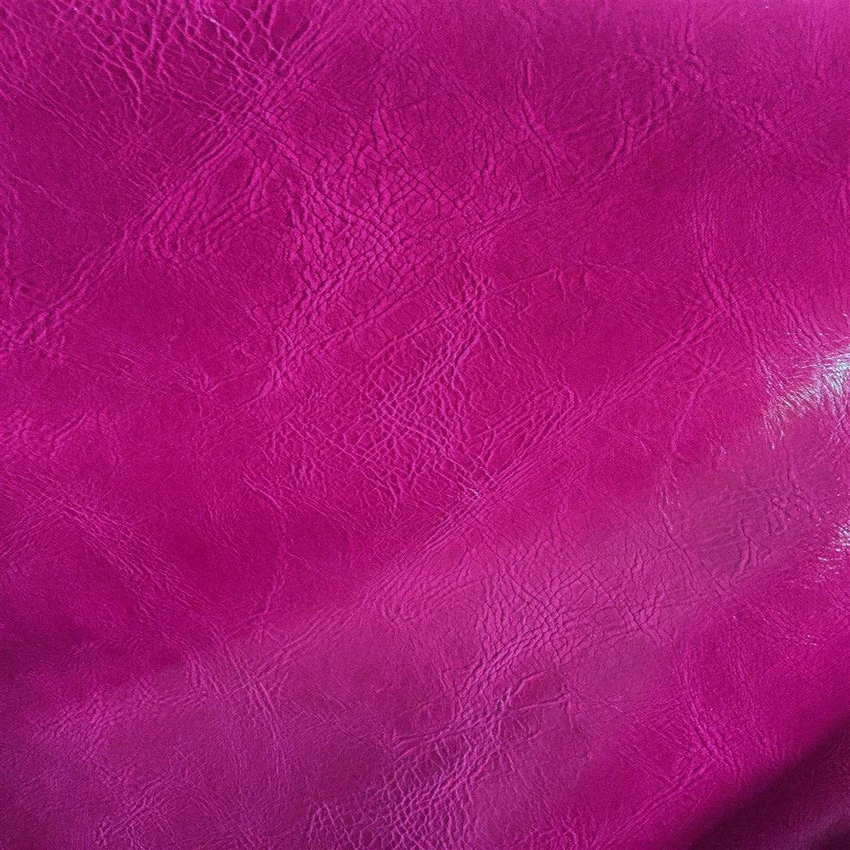 Fuchsia Distressed Faux Leather Fabric - Fashion Fabrics Los Angeles 