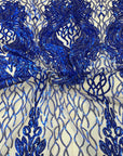 Tissu en dentelle extensible à paillettes bleu royal lionne 