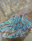 Tela de encaje de lentejuelas elásticas leona iridiscente azul perla 