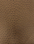 Tela de vinilo de piel sintética de avestruz marrón Saratoga 