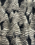 Tela de piel sintética de plumas de puercoespín negro 