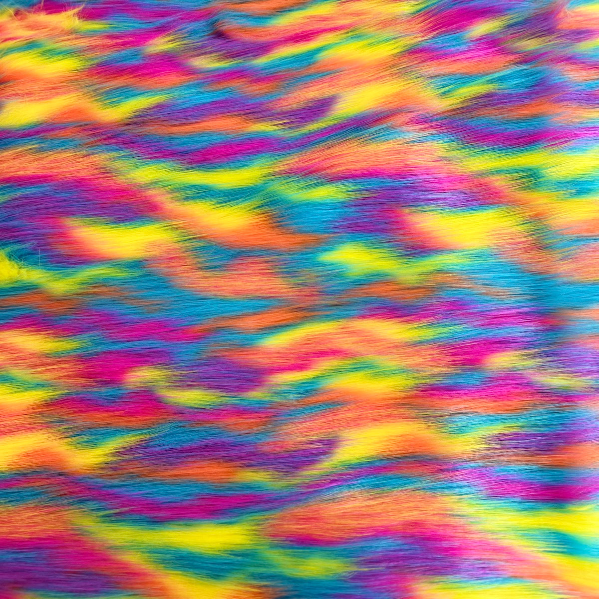 Tissu fausse fourrure Ysidro à poils longs multicolore arc-en-ciel 