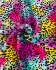 Tissu fausse fourrure imprimé léopard arc-en-ciel 