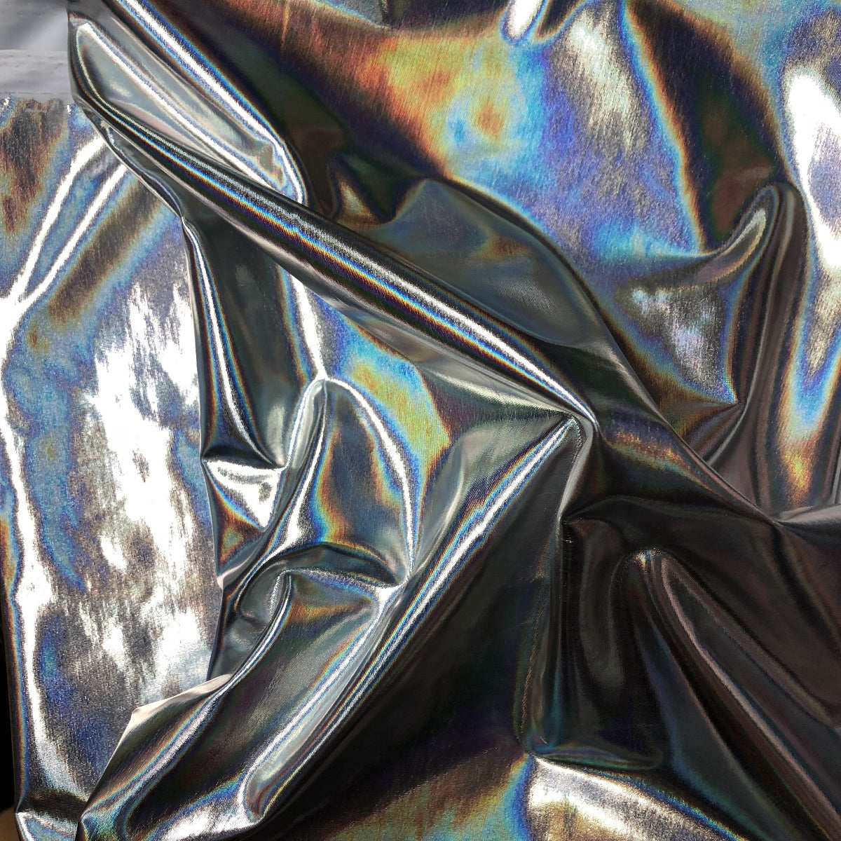 Silver Metallic Iridescent Foil Spandex Fabric - Fashion Fabrics Los Angeles 