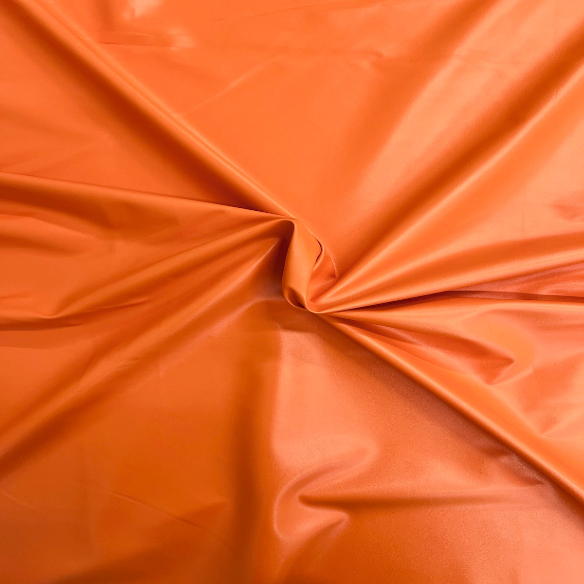 Tela de vinilo de piel sintética elástica bidireccional naranja 