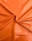 Tela de vinilo de piel sintética elástica bidireccional naranja 