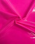 Tela de vinilo para ropa de charol sintético rosa neón