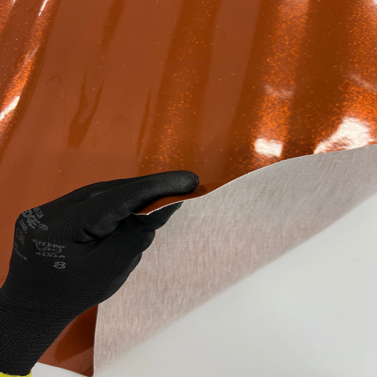 Tissu vinyle pailleté orange rouille
