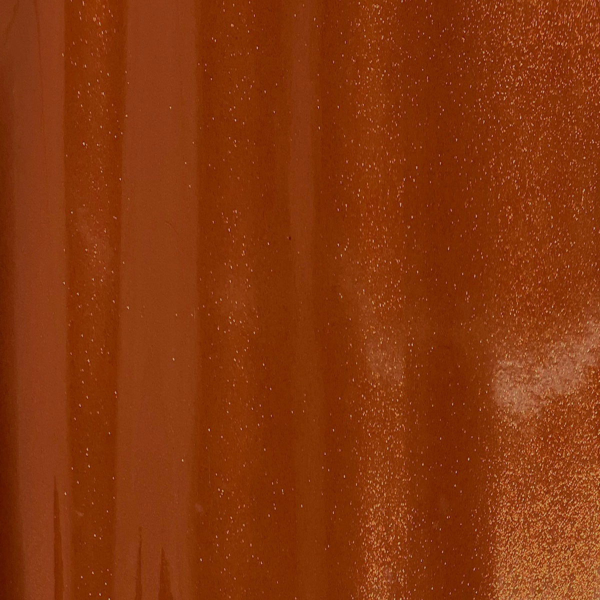 Tissu vinyle pailleté orange rouille