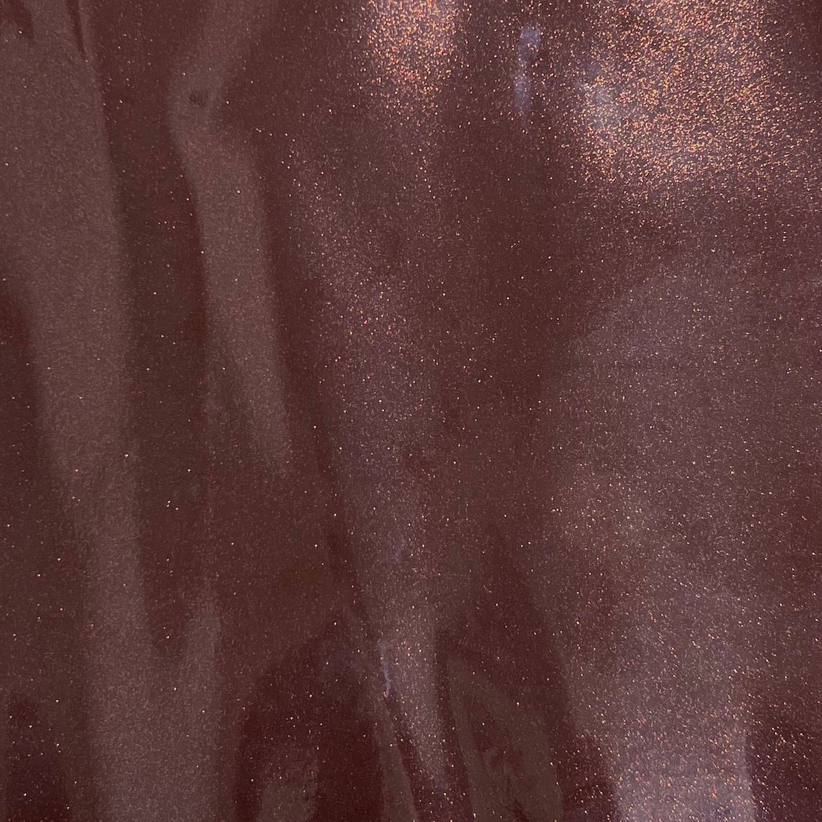 Tela de vinilo marrón chocolate con purpurina brillante