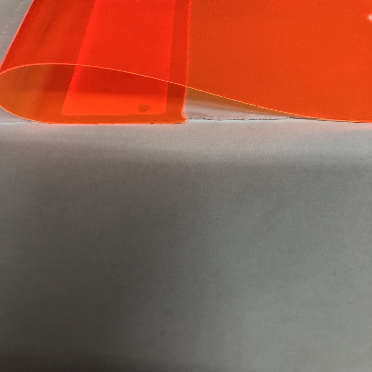 Orange Marine PVC Tinted Plastic Vinyl Fabric - Fashion Fabrics Los Angeles 