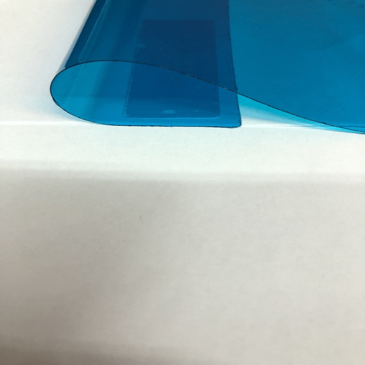 Blue Marine PVC Tinted Plastic Vinyl Fabric - Fashion Fabrics Los Angeles 