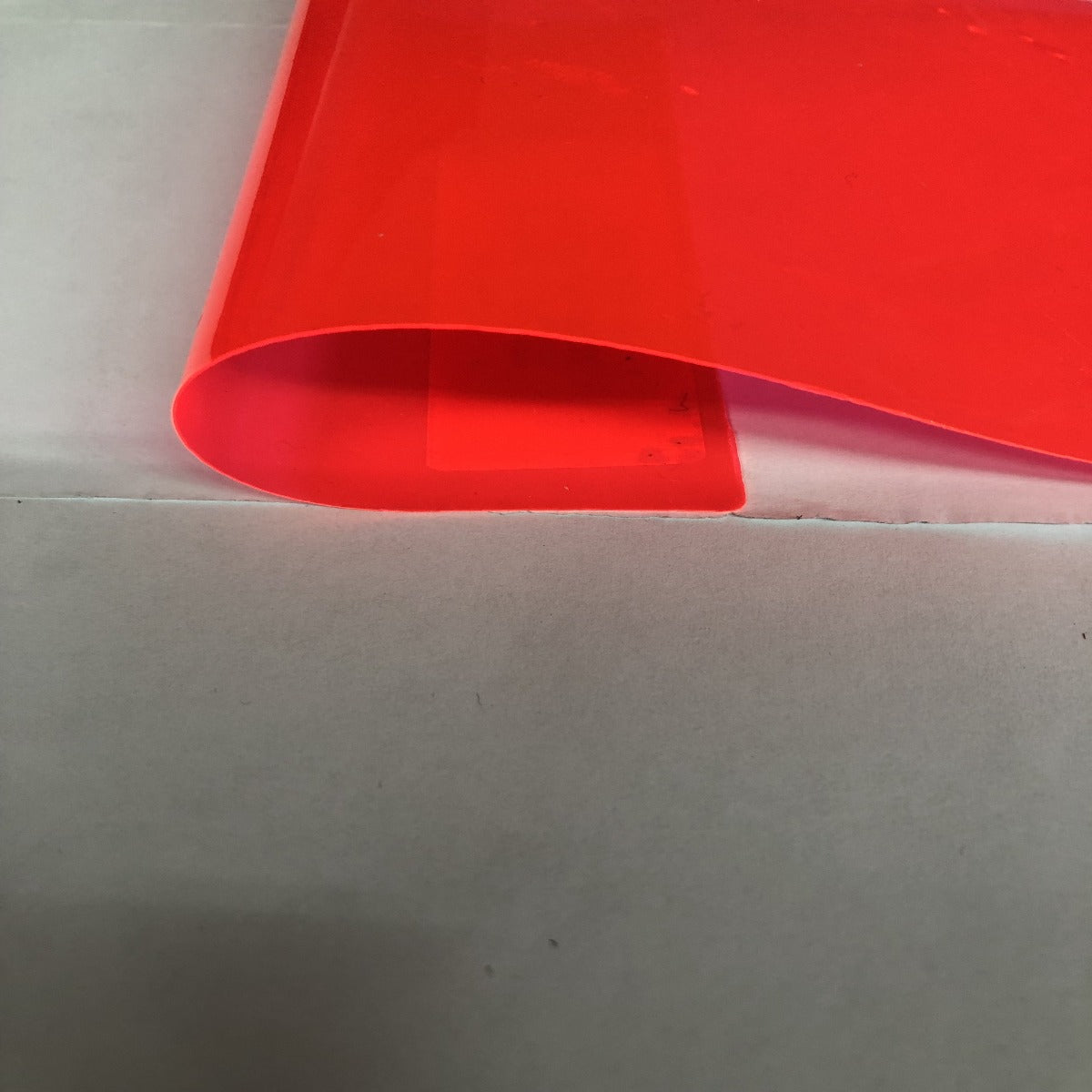 Coral Red Marine PVC Tinted Plastic Vinyl Fabric - Fashion Fabrics Los Angeles 