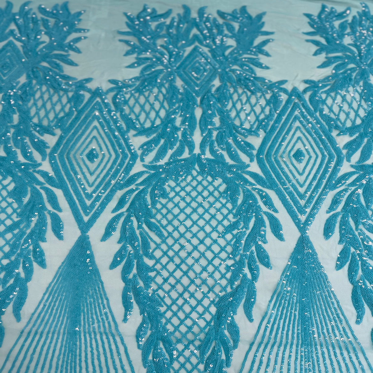 Tissu en dentelle à paillettes Alpica bleu aqua 