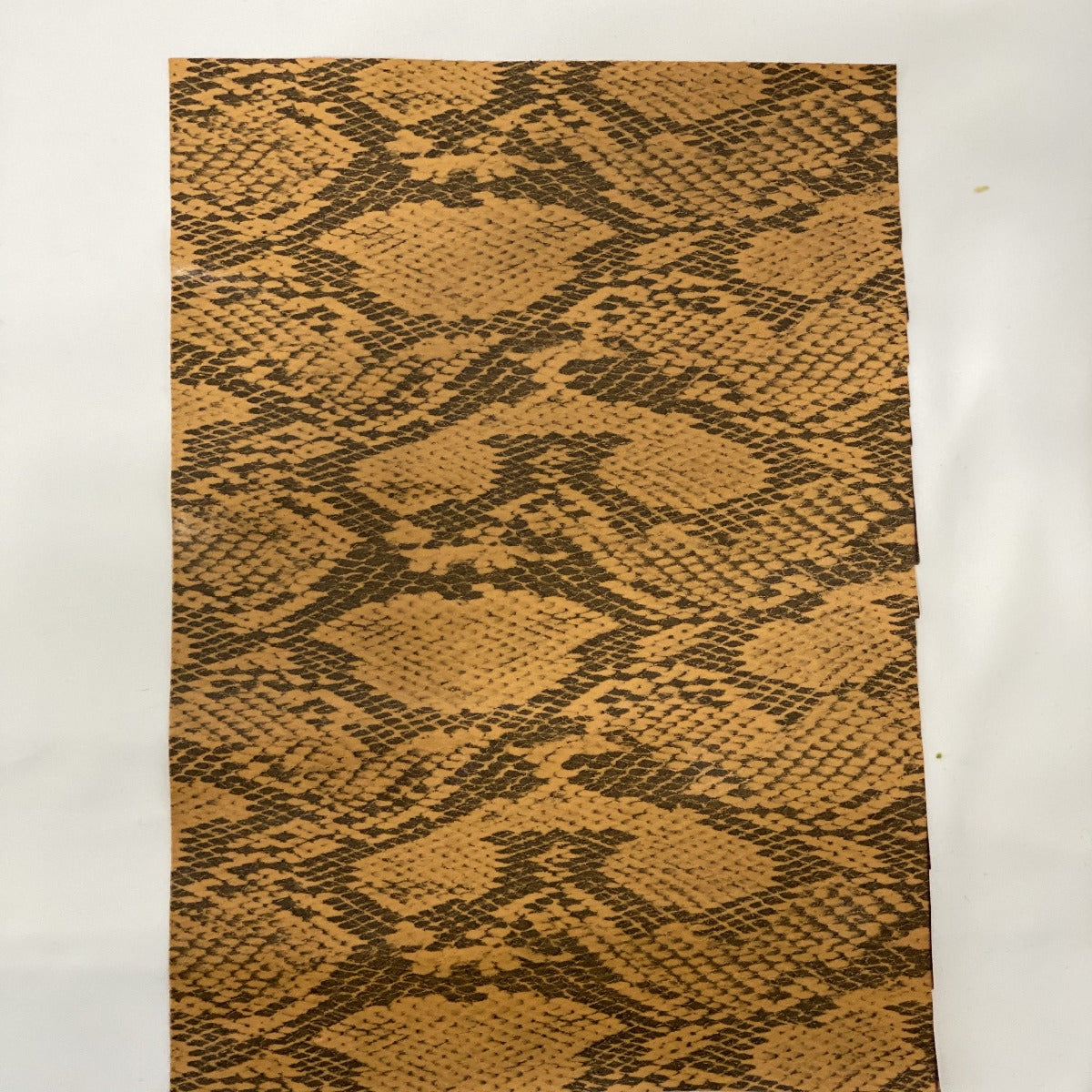 Gold Piuma Snakeskin Vinyl Fabric - Fashion Fabrics Los Angeles 