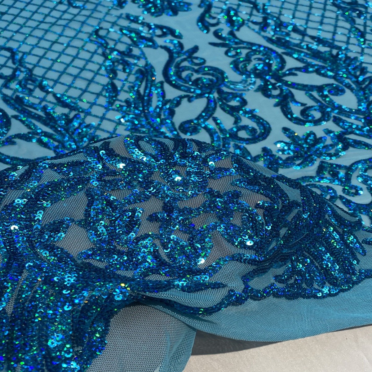 Turquoise Iridescent Luna Stretch Sequins Lace Fabric - Fashion Fabrics LLC