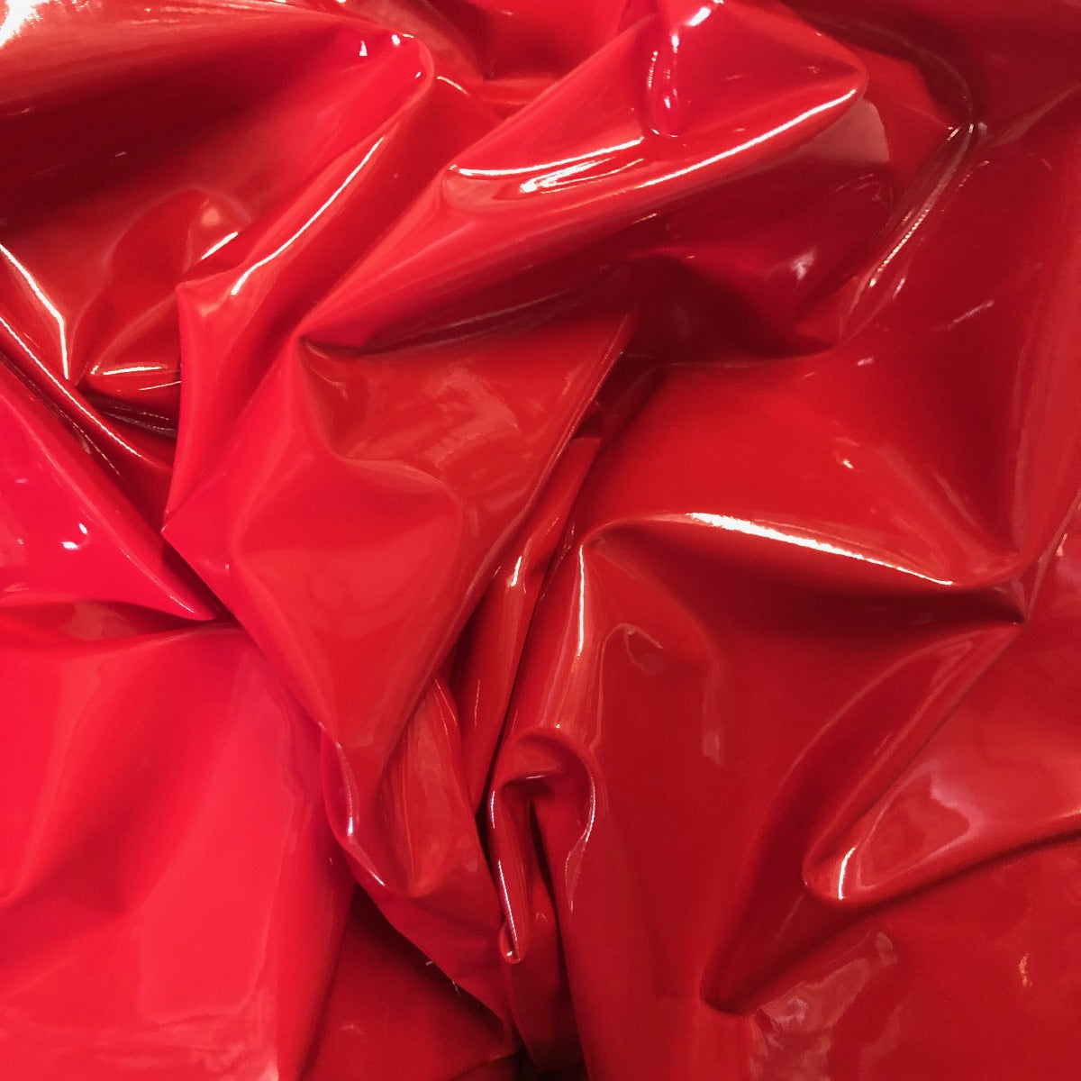 Red Liquid Shiny Vinyl Spandex Fabric - Fashion Fabrics Los Angeles 