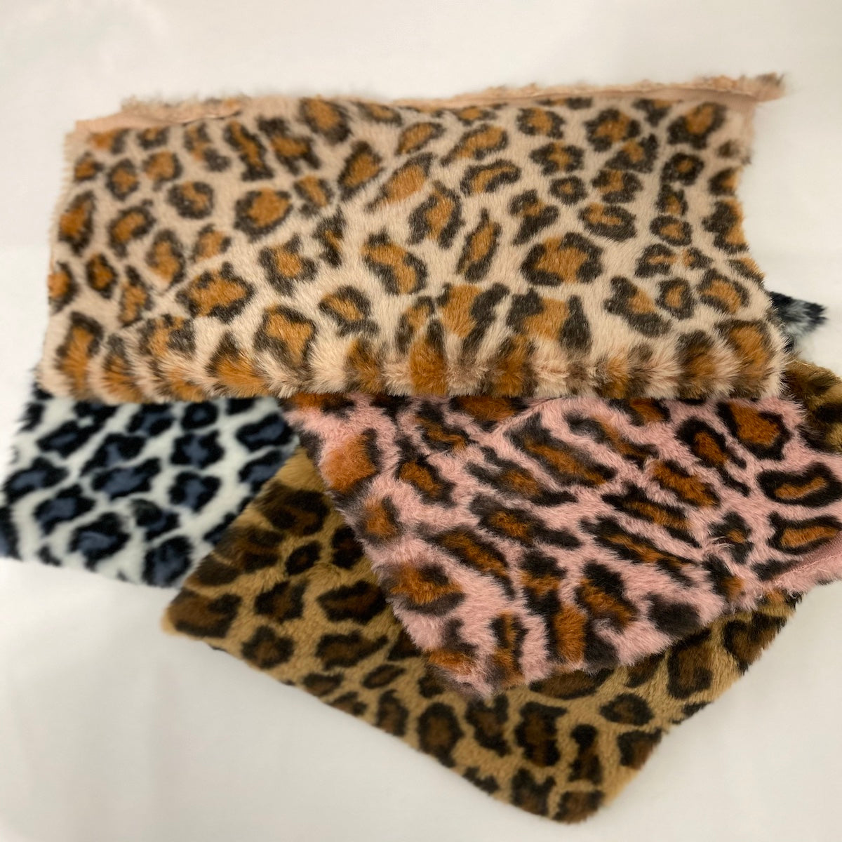 Ice Gray Minky Leopard Faux Fur Fabric - Fashion Fabrics Los Angeles 