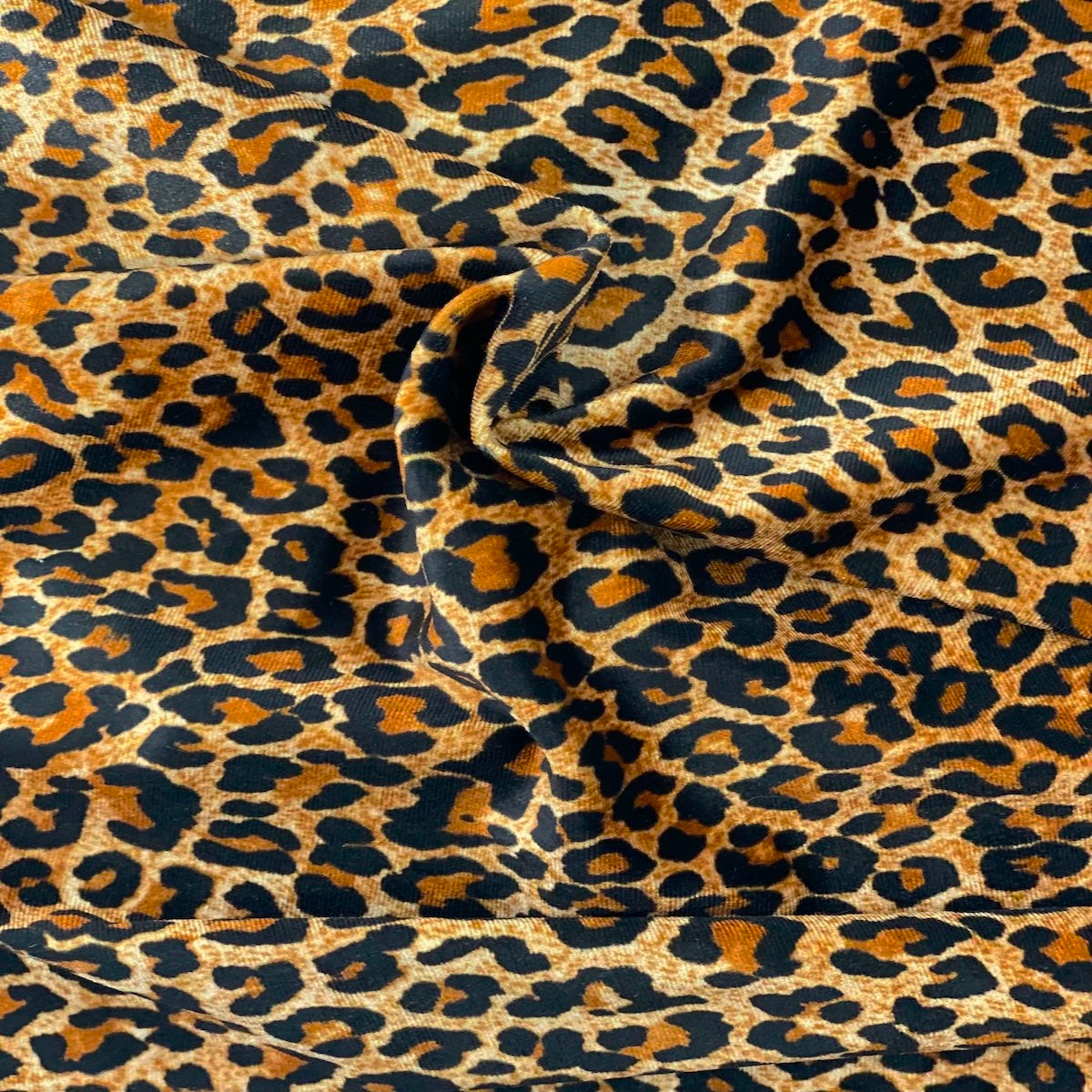 Baby Leopard Print Stretch Velvet Fabric - Fashion Fabrics Los Angeles 