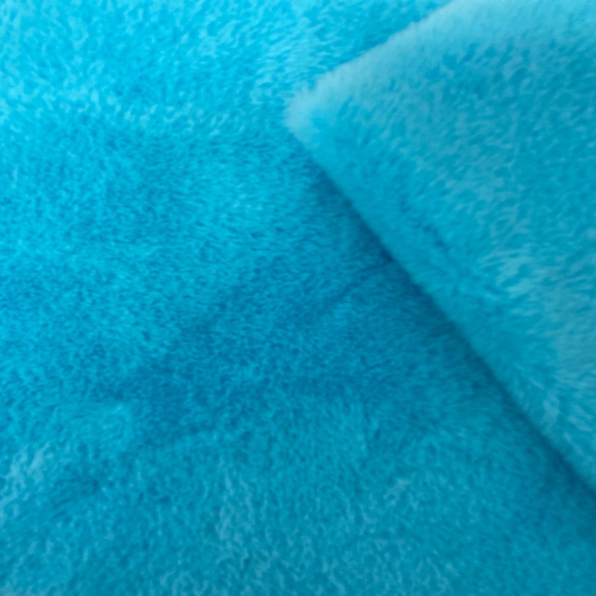 Aqua Blue Rabbit Soft Cuddle Faux Fur Fabric - Fashion Fabrics LLC