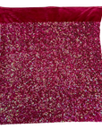 Tissu rodéo en velours extensible brodé de paillettes irisées fuchsia