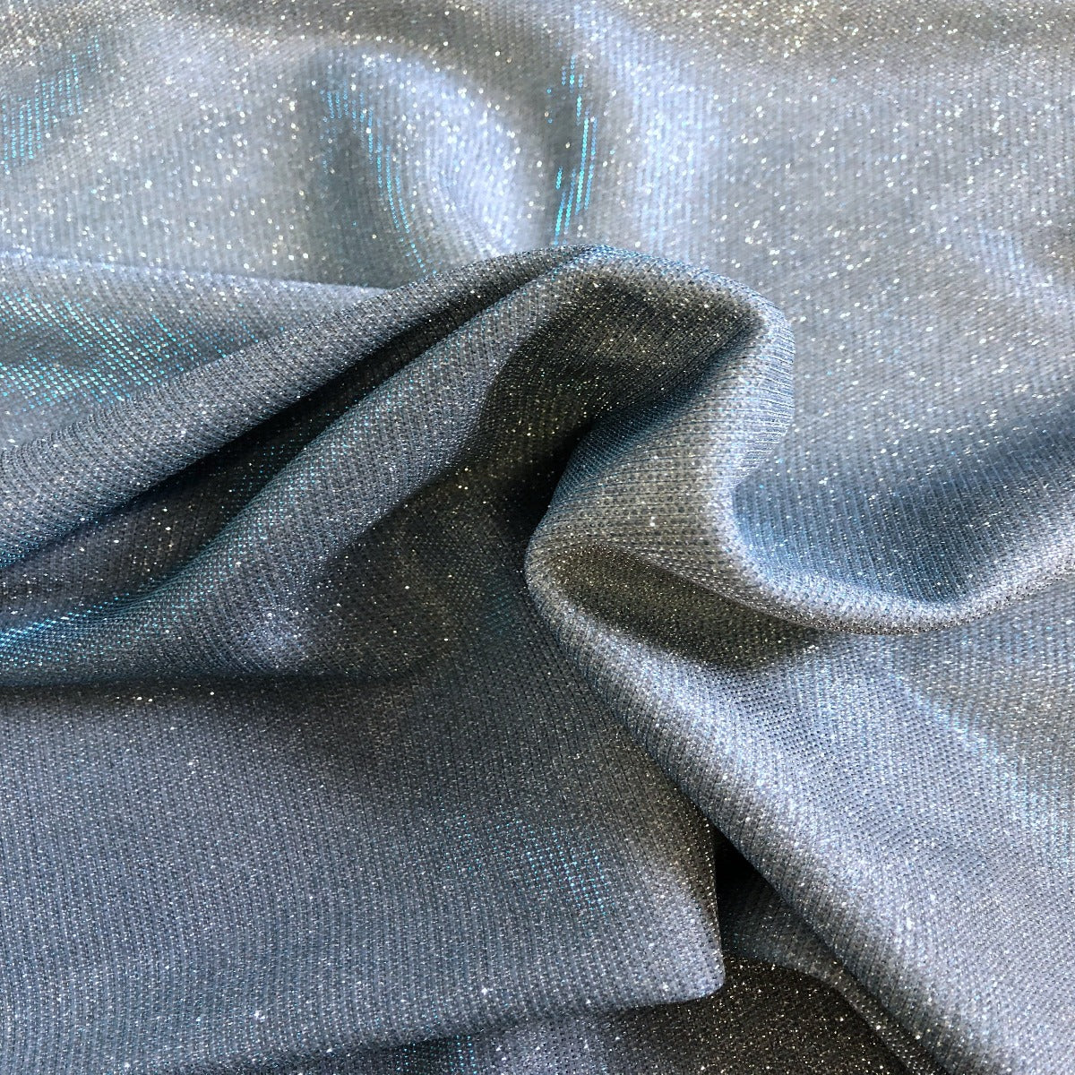 Baby Blue Silver Holographic Shimmer Glitter Spandex Fabric - Fashion Fabrics Los Angeles 
