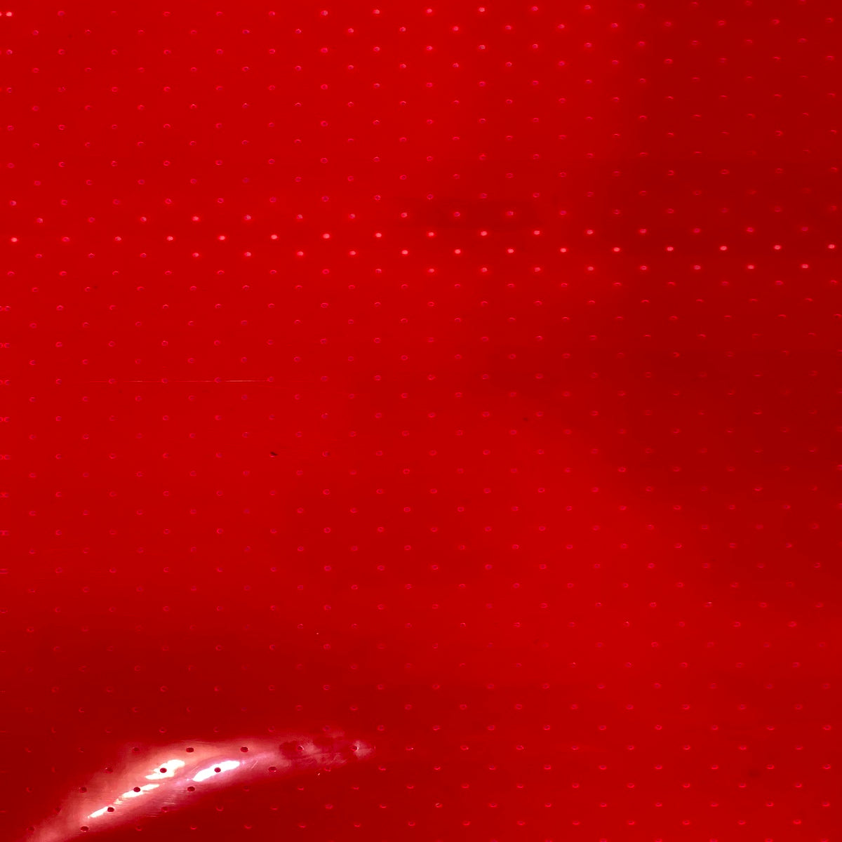 Red Perforated Tinted PVC Marine Clear Vinyl Fabric - Fashion Fabrics LLC