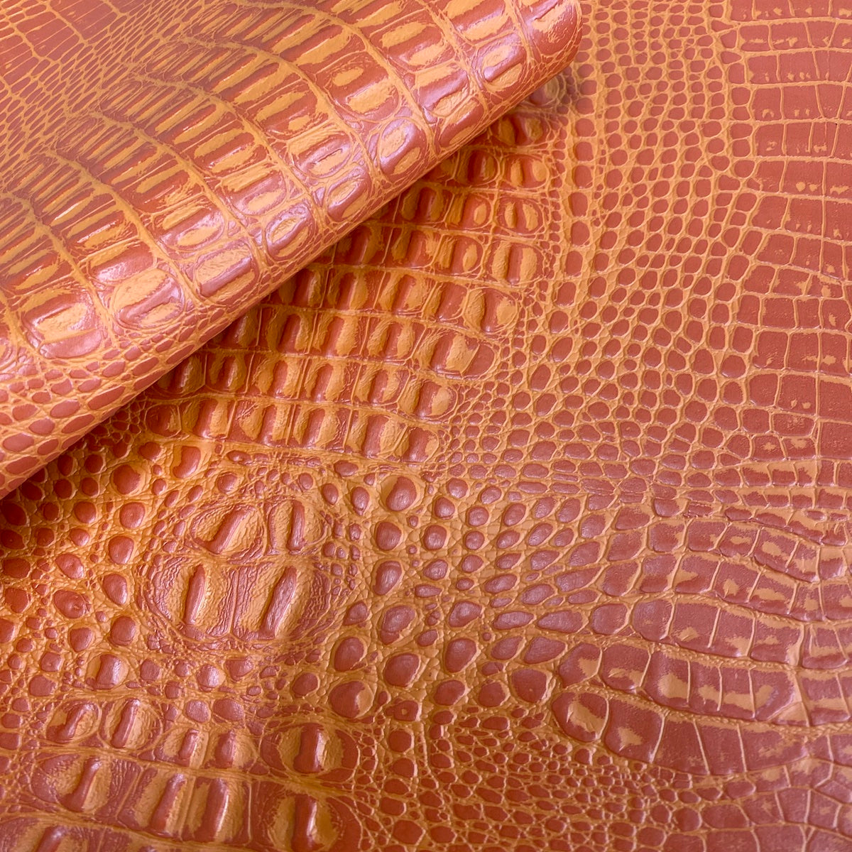 Orange Marine Gator Vinyl Fabric - Fashion Fabrics LLC