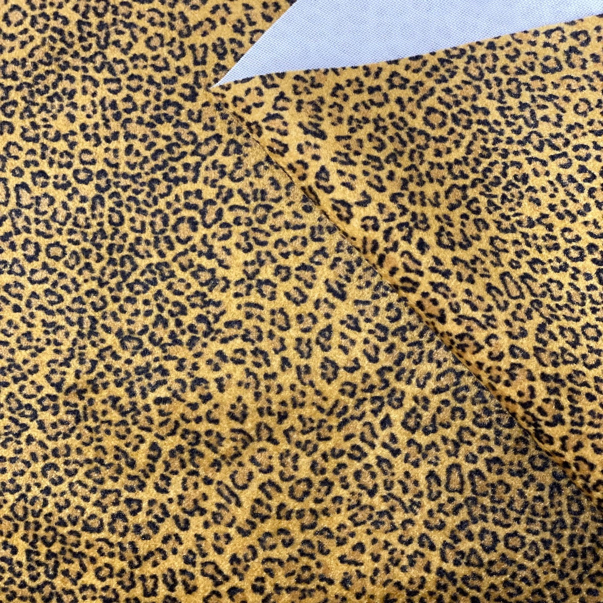 Jaguar Print Velvet Flocking Fabric - Fashion Fabrics LLC