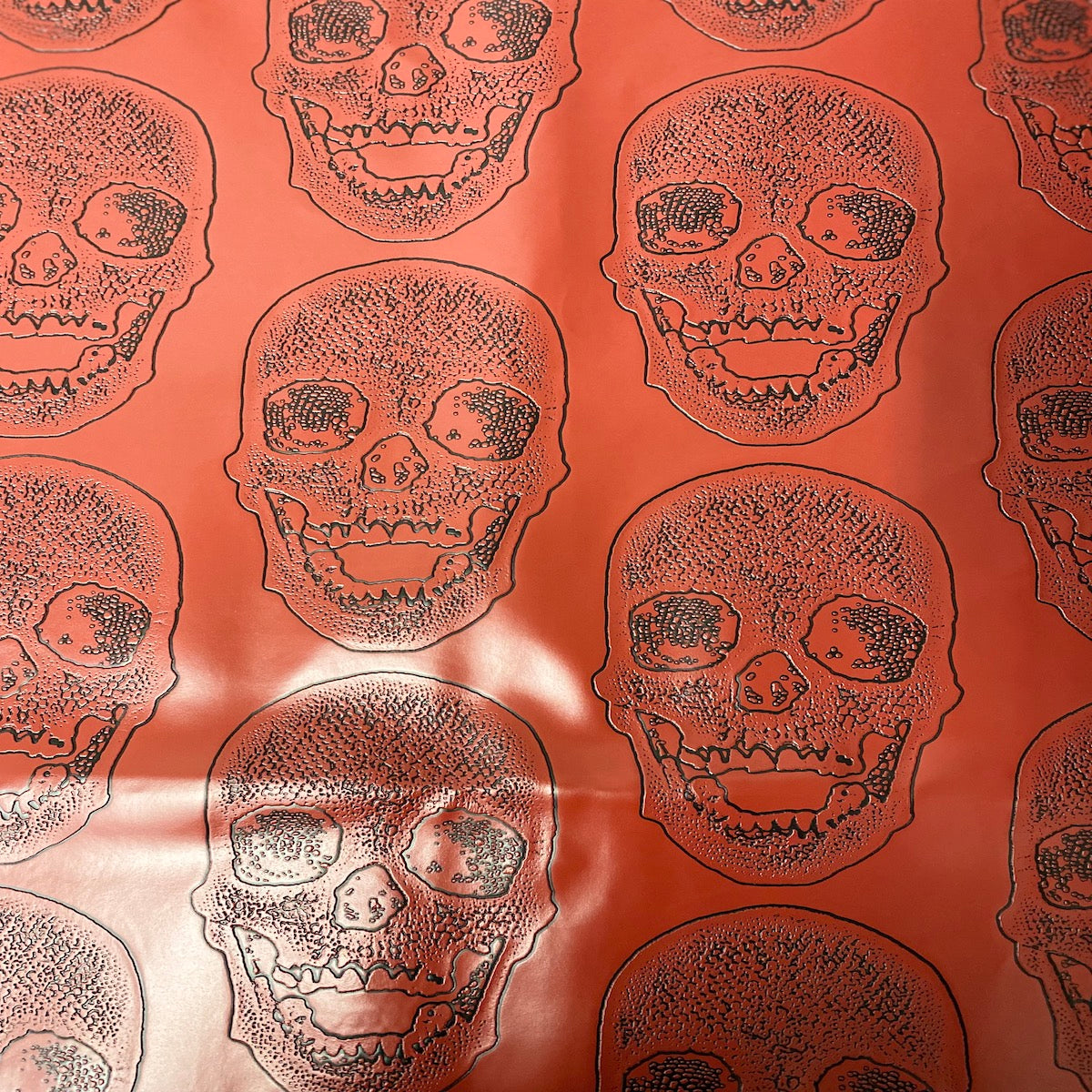 Red Skeleton Skull Vinyl Fabric - Fashion Fabrics LLC