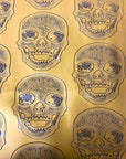Gold Skeleton Skull Vinyl Fabric - Fashion Fabrics LLC
