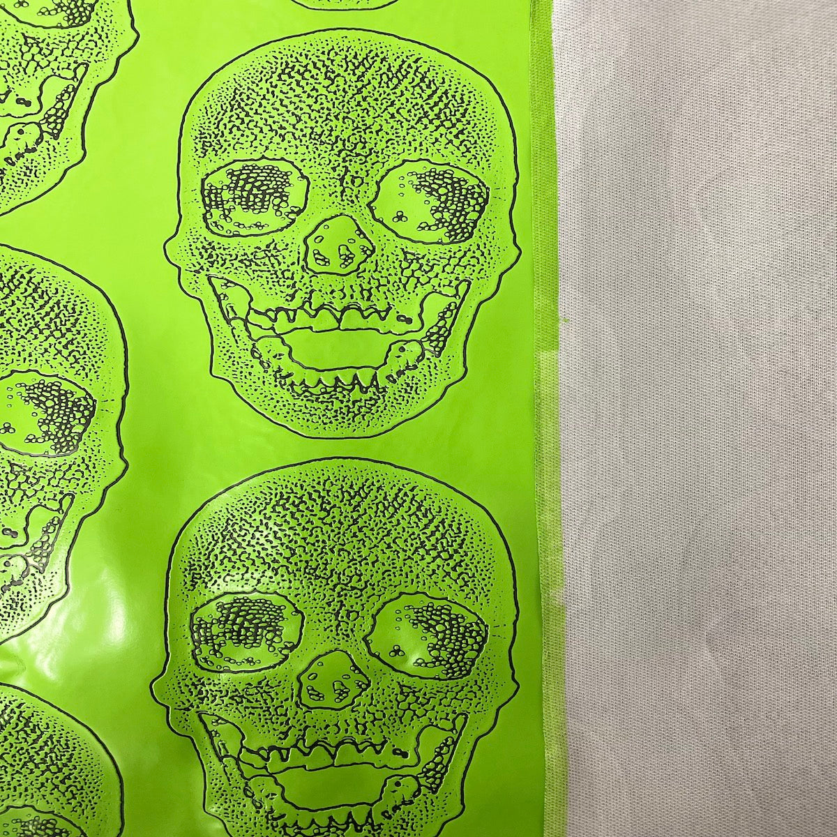 Lime Green Skeleton Skull Vinyl Fabric - Fashion Fabrics LLC