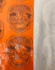 Orange Skeleton Skull Vinyl Fabric - Fashion Fabrics LLC