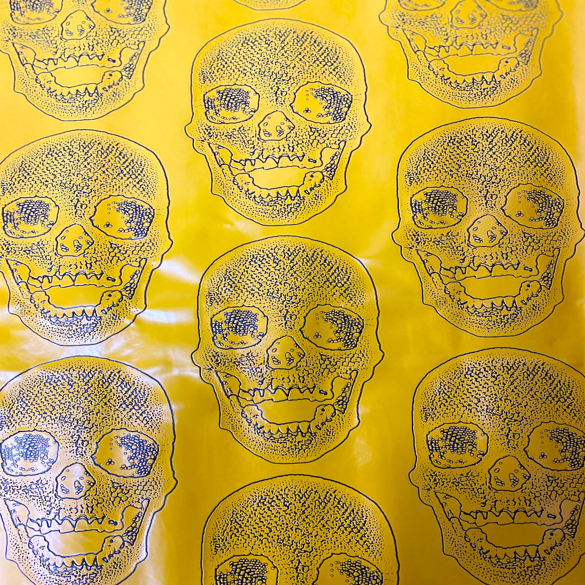 Yellow Skeleton Skull Vinyl Fabric - Fashion Fabrics LLC
