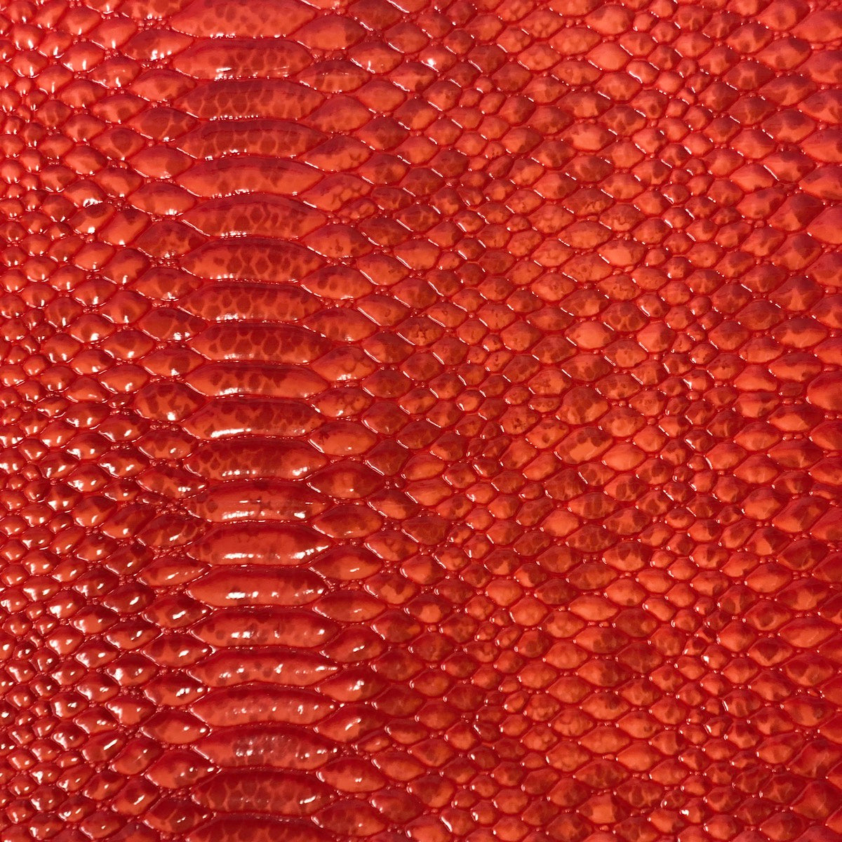 Red Culebra Patent 3D Embossed Snakeskin Vinyl Fabric - Fashion Fabrics LLC