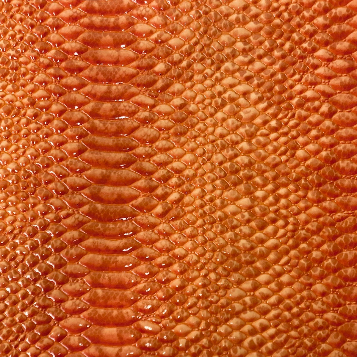 Orange Culebra Patent 3D Embossed Snakeskin Vinyl Fabric - Fashion Fabrics LLC