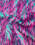 Tela de piel sintética lanuda de tres puntas, color azul, rosa y morado