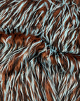 Tela de piel sintética lanuda de tres púas, marrón, negro, azul