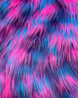 Tela de piel sintética lanuda de tres tonos azul, rosa y morado
