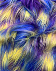 Tela de piel sintética lanuda de tres tonos, azul, amarillo, morado