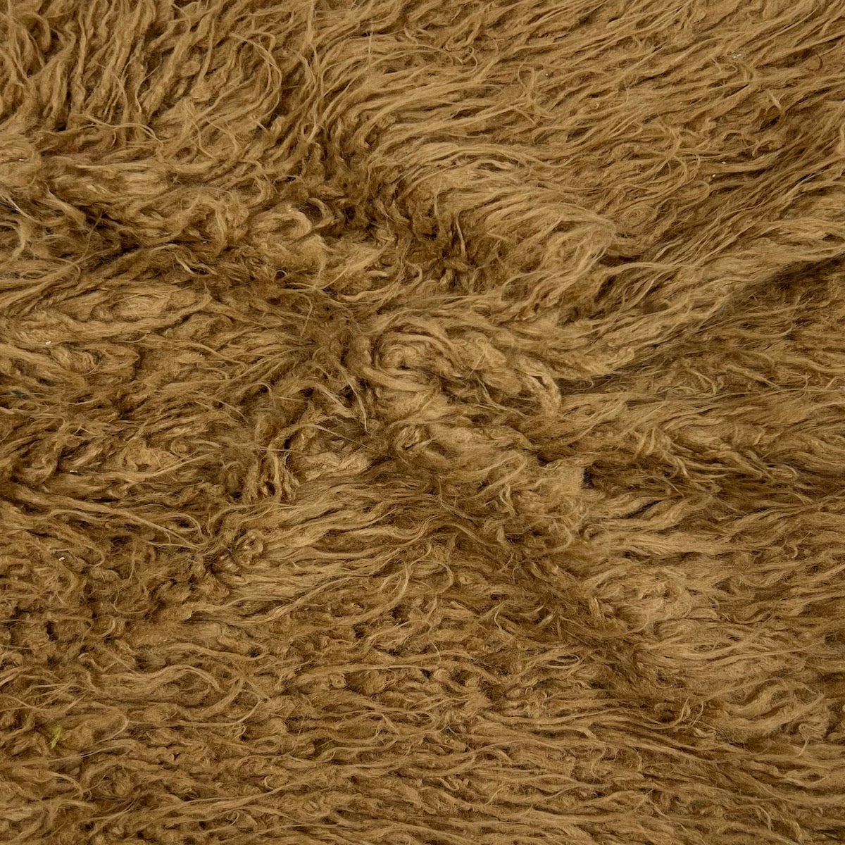 Tissu en fausse fourrure bouclée à poils longs en alpaga marron caramel 