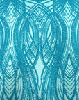 Tela de encaje de lentejuelas elásticas Selena Wave azul aguamarina 